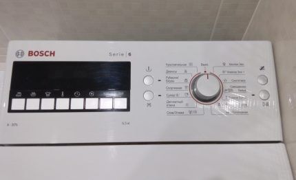 Вертикальная стиралки BOSCH WOT 24455 OE Стиральная машина BOSCH WOT 24455 OE