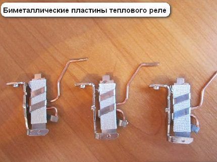 При перегрузке полоска деформируется и разрывает электроцепь Биметаллическая пластина